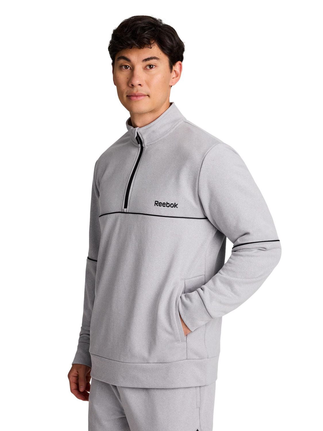 Reebok Chandail en tissu éponge à quart de fermeture éclair pour hommes