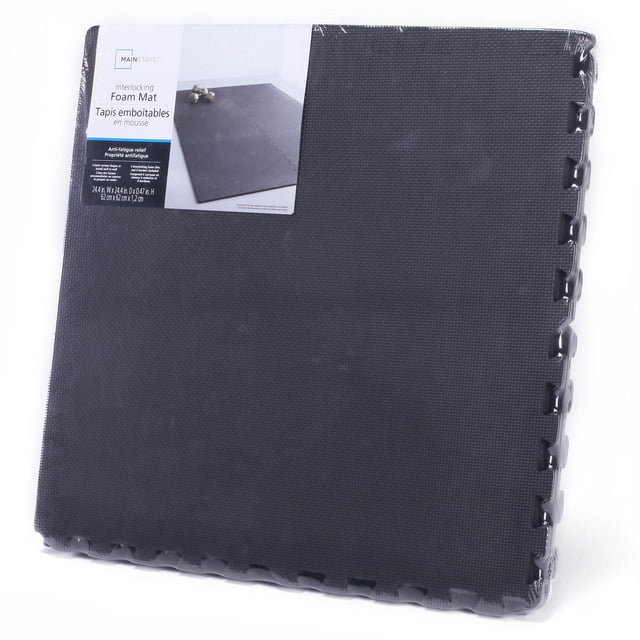 Mainstays Interlocking Foam Mat in black with textured surface and puzzle-piece edges, packaged in clear plastic with label highlighting anti-fatigue relief and easy interlocking design, suitable for cushioning floors in home gyms, play areas, or for shock absorption and floor protection.