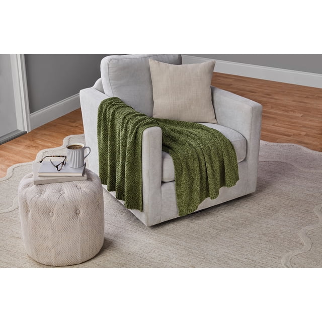 Mainstays Mossy Green Chenille Throw, 50" x 72" folded front-facing throw highlighting soft chenille pile and subtle ribbed weave in mossy green, rectangular 50 by 72 inches, 100% polyester fabric, often used as a cozy sofa accent or lap blanket on a neutral backdrop.