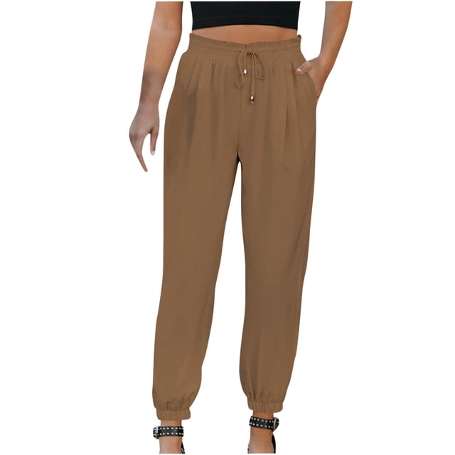 Jovati Woman Solid Color Cotton and Linen Drawstring Elastic Waist Long Straight Pants in a brown shade. These ankle-length pants feature a casual style with an elastic waistband, drawstring closure, and side pockets. Made from lightweight cotton and linen fabric, they are designed for comfort and versatility, suitable for casual and daily wear during summer and spring.