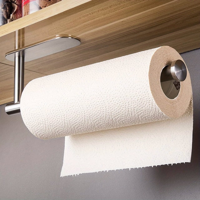 1pc self-adhesive paper towel holder under cabinet for kitchen or bathroom, made of stainless steel with a wall-mounted design. Ideal for kitchen organization, the holder is shown installed under a wooden cabinet, holding a roll of white paper towels.