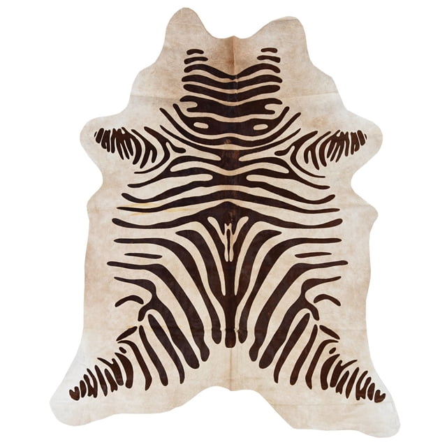 Cowhide rug, medium brindle full skin featuring natural beige to brown tones with dark brindle stripes, oversized Brazilian hide with genuine suede backing and natural marks, suitable for layering over area rugs in eclectic or contemporary home decor.