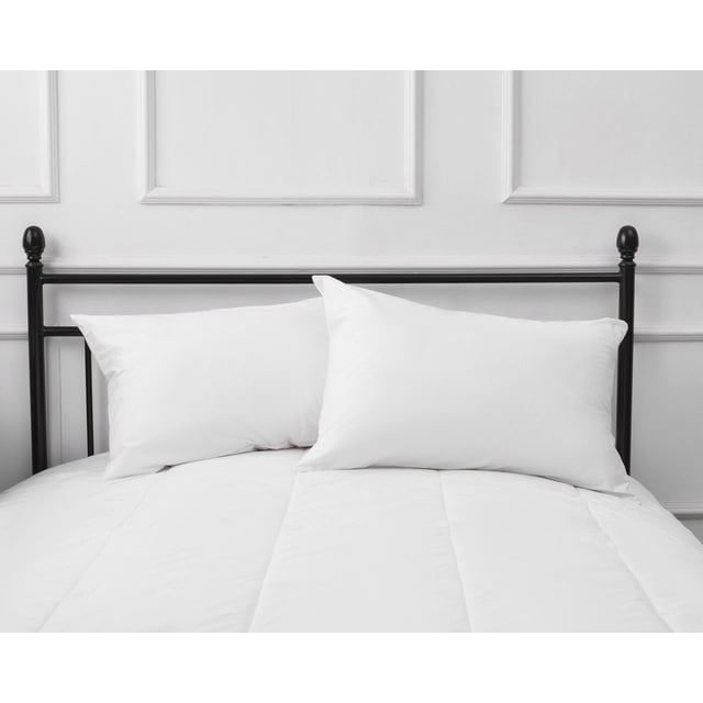 SilverClear 100% Cotton Pillow Protector - Two Pack on a bed with two white pillows, made of 250 thread count breathable cotton treated with SilverClear to reduce odours, featuring zipper closure and hypoallergenic fabric for comfort and protection.