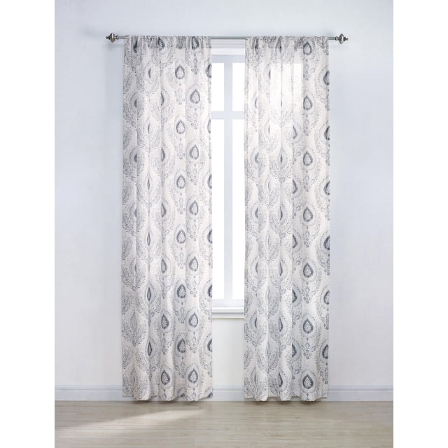 Mainstays Tille 84" Printed Rod Pocket Window Curtains Panel featuring two white polyester panels with grey botanical arabesque print hanging on a silver rod over a window. The 40 by 84 inch panels gently filter light and enhance privacy with a single rod pocket for easy installation. Machine washable and ideal for softening natural light in living or bedroom spaces.
