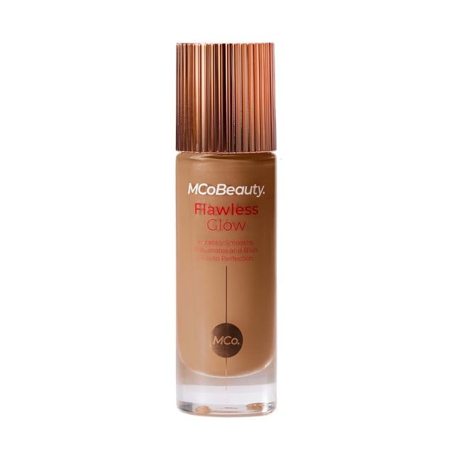 MCoBeauty - Flawless Glow - Luminous Skin Filter - 4-in-1 Foundation - 6.5 Natural Honey - 30ml bottle with ribbed rose gold cap, containing medium honey liquid foundation that smooths, blurs imperfections, and provides a luminous dewy finish, ideal for use alone, as primer, mixed with foundation, or highlighter.