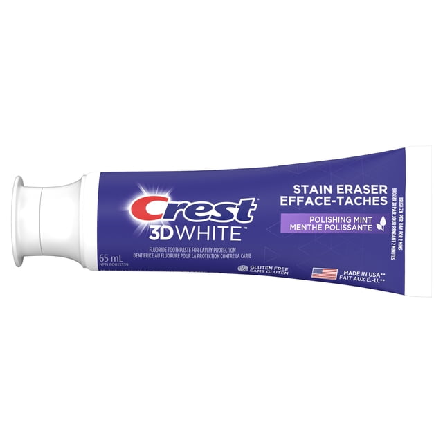 Crest 3D White Stain Eraser Teeth Whitening Toothpaste in Polishing Mint flavor, 65 mL tube with blue packaging and white cap, featuring bilingual English-French text for stain removal, cavity protection, and gluten-free formula, made in USA, suitable for daily oral care.