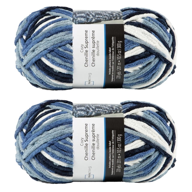 MAINSTAYS 2 pack denim blue polyester yarn with two skeins of chenille-style yarn in blue, navy, and white. Each skein contains 220 yards (201 meters) of 100% polyester yarn weighing 10.5 ounces (300 grams), suitable for knitting blankets, pillows, scarves, and home décor projects.