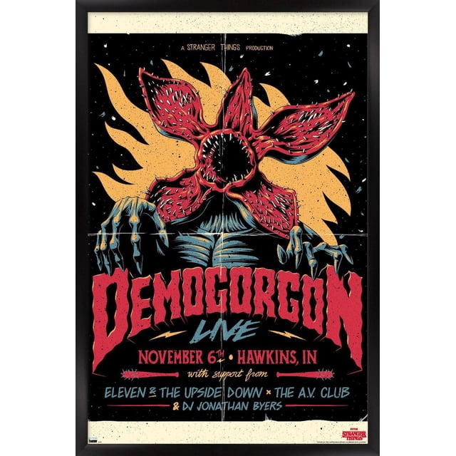 Netflix Stranger Things - Affiche Murale Demogorgon en Direct, 22,375 Pouces x 34 Pouces Encadrée, Représentant un Demogorgon Orienté vers l'Avant avec une Bouche Ouverte de Pétale Rouge et des Dents Tranchantes sur un Fond Noir avec des Formes de Flamme orange. l'Affiche Comprend un Texte Rouge Audacieux « Demogorgon Live » et des Détails d'Événement pour le 6 Novembre à Hawkins, en, avec le Soutien de Eleven & The Upside Down, The A.V. Club, et D