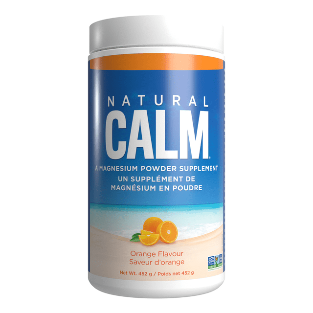 Natural Calm Magnesium Citrate Powder in orange flavour, 452g container. The label features a beach scene with oranges and highlights its quick-absorbing magnesium formula for stress relief, improved sleep, and heart health. Suitable for hot or cold drinks.