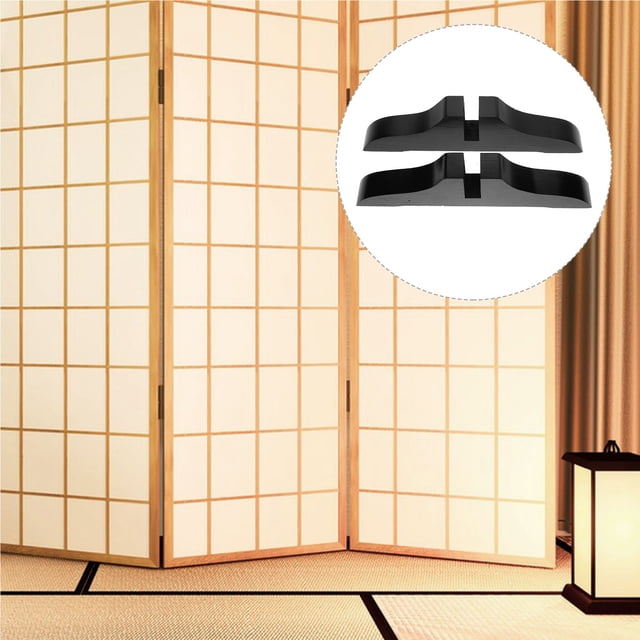 USHOBE 2Pcs Partition Support Wooden Room Divider Support Feet in black, featuring a creative rectangular design. Made of wood, each stand measures 29.50x8.00x3.50 cm (11.59x3.14x1.38 in). These divider feet are designed to support room dividers for space partitioning in areas like dining rooms, living rooms, bedrooms, offices, or relaxation spaces. The smooth surface and polished finish ensure safety and a neat appearance. The image shows the stands in a modern interior setting with a wooden room divider.