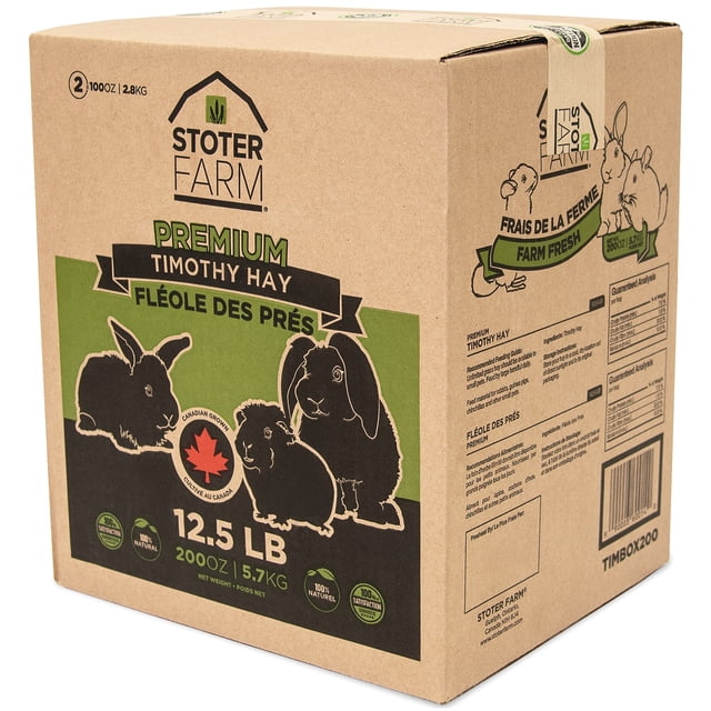 Stoter Farm Timothy Hay 12.5 lb. box featuring 100% Canadian-grown hay for rabbits, guinea pigs, chinchillas, and other small pets. The box displays a natural brown cardboard design with green and black accents, illustrations of small animals, and a red maple leaf symbolizing Canadian origin. The packaging highlights features such as being pesticide-free, sun-dried, and fresh, with a guaranteed weight of 200oz (5.6kg).