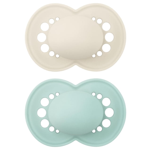 MAM Original Matte Pacifier 2 pack with one beige and one light blue orthodontic pacifier for babies 6 plus months, featuring symmetrical matte shields with ventilation holes designed to promote healthy oral development and comfort.