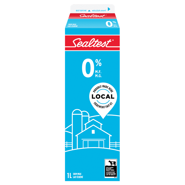 Sealtest Skim 0% Milk 1L carton in blue and red with white text, featuring 0% milk fat, local Canadian dairy farm graphic, and highlighting quality Canadian skim milk rich in calcium and vitamin D, free from antibiotics and artificial hormones.