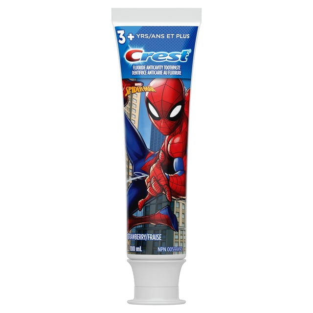 Crest Kid's Toothpaste featuring Marvel's Spiderman in a 100 mL tube with strawberry flavour, designed for children aged 3 and up, showing Spiderman swinging between city buildings on the packaging, providing cavity protection and enamel strengthening.