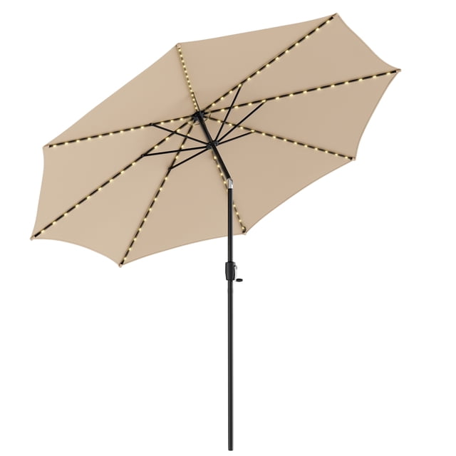 Patiojoy 10FT Solar Umbrella with 112 LED lights, beige polyester canopy, and black metal pole. Designed for outdoor shade, it features a crank lifting handle, push-button tilt system, and 2-tier canopy for ventilation. Solar panel powers LED lights for up to 6 hours, ideal for patios, markets, or outdoor tables.