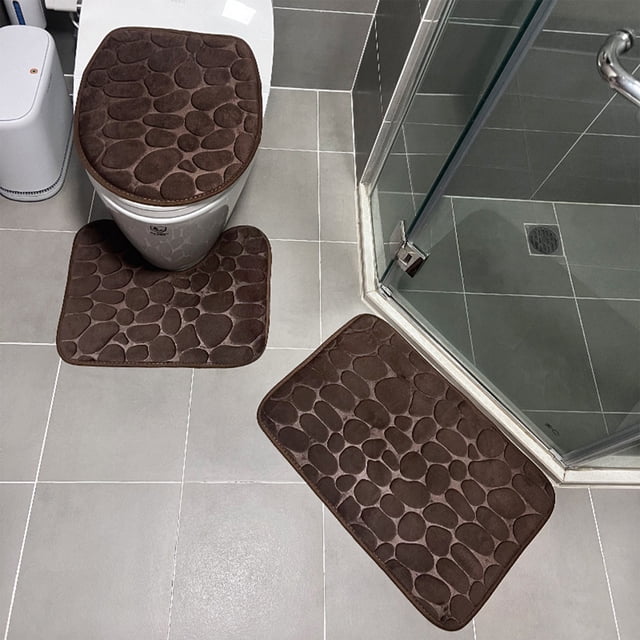 Back To School! Thick bathroom rugs mat set by LEUTSIN, a 3-piece bathroom rug set in coffee colour with cobblestone texture. Includes a U-shaped mat for toilet base, a small mat, and a larger absorbent bath mat. Made of polyester with non-slip PVC backing, designed for high water absorption and comfort. Ideal for bathrooms, saunas, showers, and other spaces.