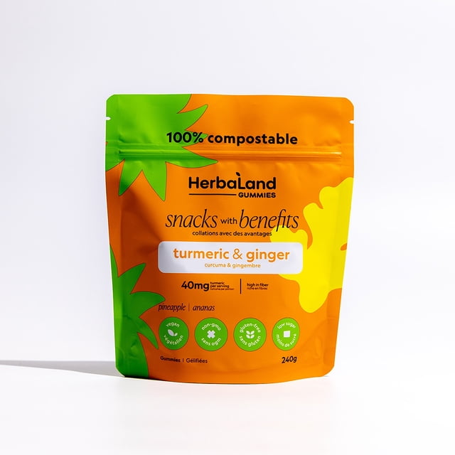 Herbaland Turmeric & Ginger Gummies, 240g, in a vibrant orange and green compostable pouch. The packaging highlights key features such as 40mg of turmeric, 10g of fiber, low sugar, vegan, and gluten-free. Includes organic ginger, pineapple, and turmeric for a flavorful snack.
