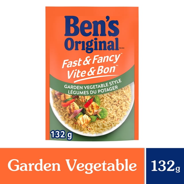 BEN'S ORIGINAL FAST & FANCY Garden Vegetable Style Rice 132g pouch showing long grain rice with red bell peppers, onions, and herbs on a white plate with grilled vegetable skewers, packaged in an orange and green bag with bilingual English and French text, suitable as a quick side dish or meal base.