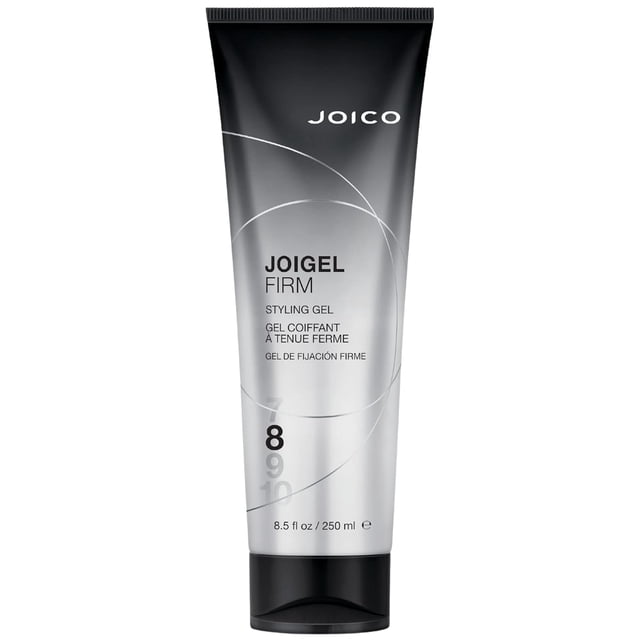 Joico JoiGel Firm Styling Gel 8.5 oz in a sleek silver and black tube with bold branding and product details displayed on the front. Ideal for men's grooming, this firm hold gel adds body, volume, and shine while controlling thick, coarse hair. Suitable for wet or dry hair styling.