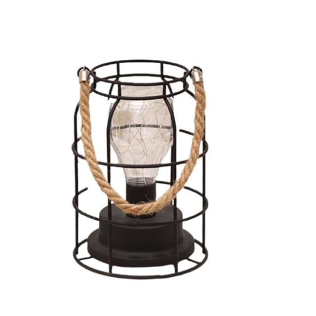 EGNMCR Desk Lamp Metal LED Lantern Battery Powered with a black metal cage design, rope handle, and Edison-style LED bulb emitting warm white light. Suitable for table lighting, weddings, parties, patios, and indoor events. Compact size of 12x12x18cm.