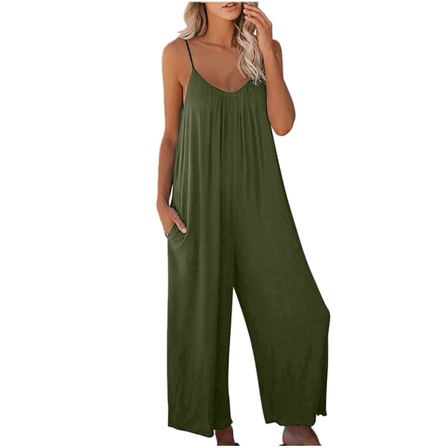 Timegard Combinaison pour Femmes avec Encolure Dégagée, Bretelles spaghetti et design Sans Manches. Cette Combinaison à Jambes Larges et Coupe Ample Est Présentée dans une Couleur Unie Vert olive, Fabriquée à Partir d'Un Mélange Léger et Respirant de polyester-spandex. la Combinaison Offre une silhouette Décontractée avec des Poches Latérales, Idéale pour les Sorties Estivales Décontractées Ou la Détente. Conçue avec des Accessoires Minimalistes, Elle Met en Valeur Son design Polyvalent et Confortable.