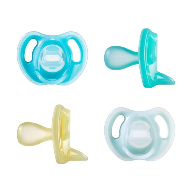 Tommee Tippee Ultra-Light Silicone Pacifier, Symmetrical One-Piece Design, BPA-Free Silicone Binkies, 6-18m, 4 Count showing front and side views in blue, pale blue, and yellow, highlighting the lightweight silicone nipple, curved shield with ventilation holes to protect skin, and reversible symmetrical design for easy correct placement.
