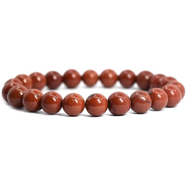 Natural Red Jasper Gemstone 8mm Round Beads Stretch Bracelet, 7 inches in length, designed for unisex wear. The bracelet features polished red jasper beads, each unique due to natural variations. Handmade with no metal, making it suitable for sensitive skin. Includes a storage pouch.