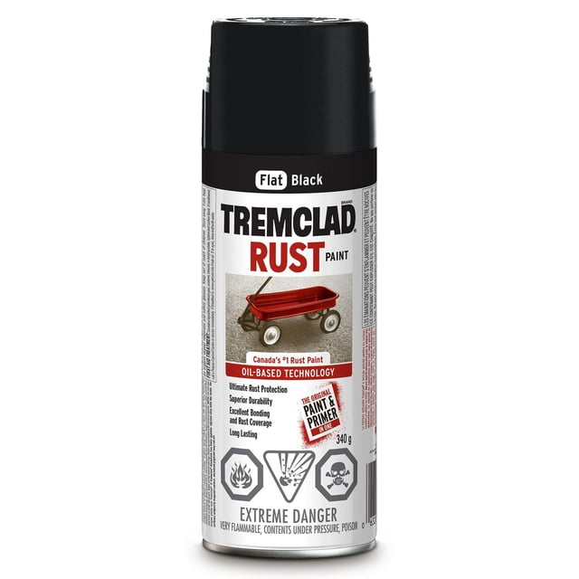 Tremclad Flat Black Rust Paint spray can with oil-based technology, designed for superior rust protection and durability on metal surfaces, featuring a red wagon image and extreme danger warnings for flammability and poison.