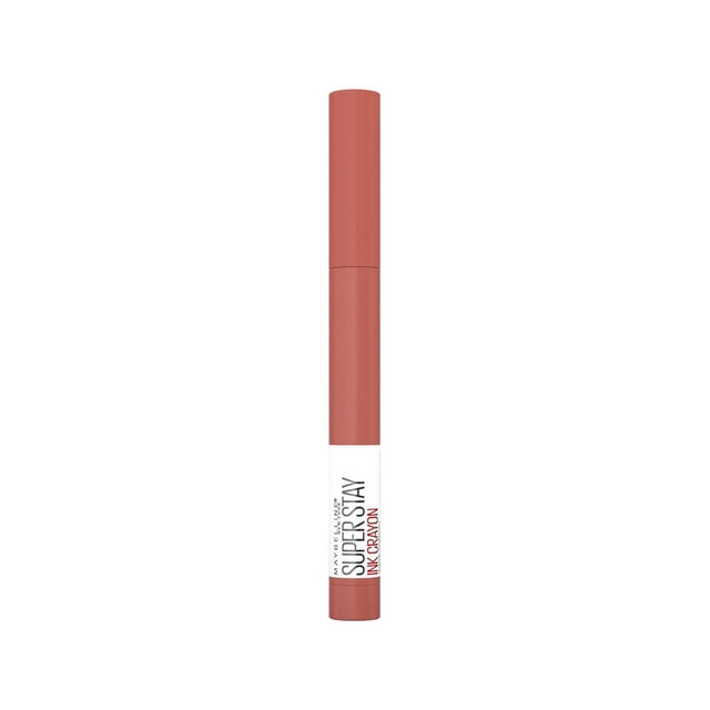 Super Stay®Ink Crayon Lipstick in muted rose colour with a matte finish, slim cylindrical design, and white label featuring brand and product name in black and red text, providing up to 8-hour wear with lasting ink technology and precise application with built-in sharpener.