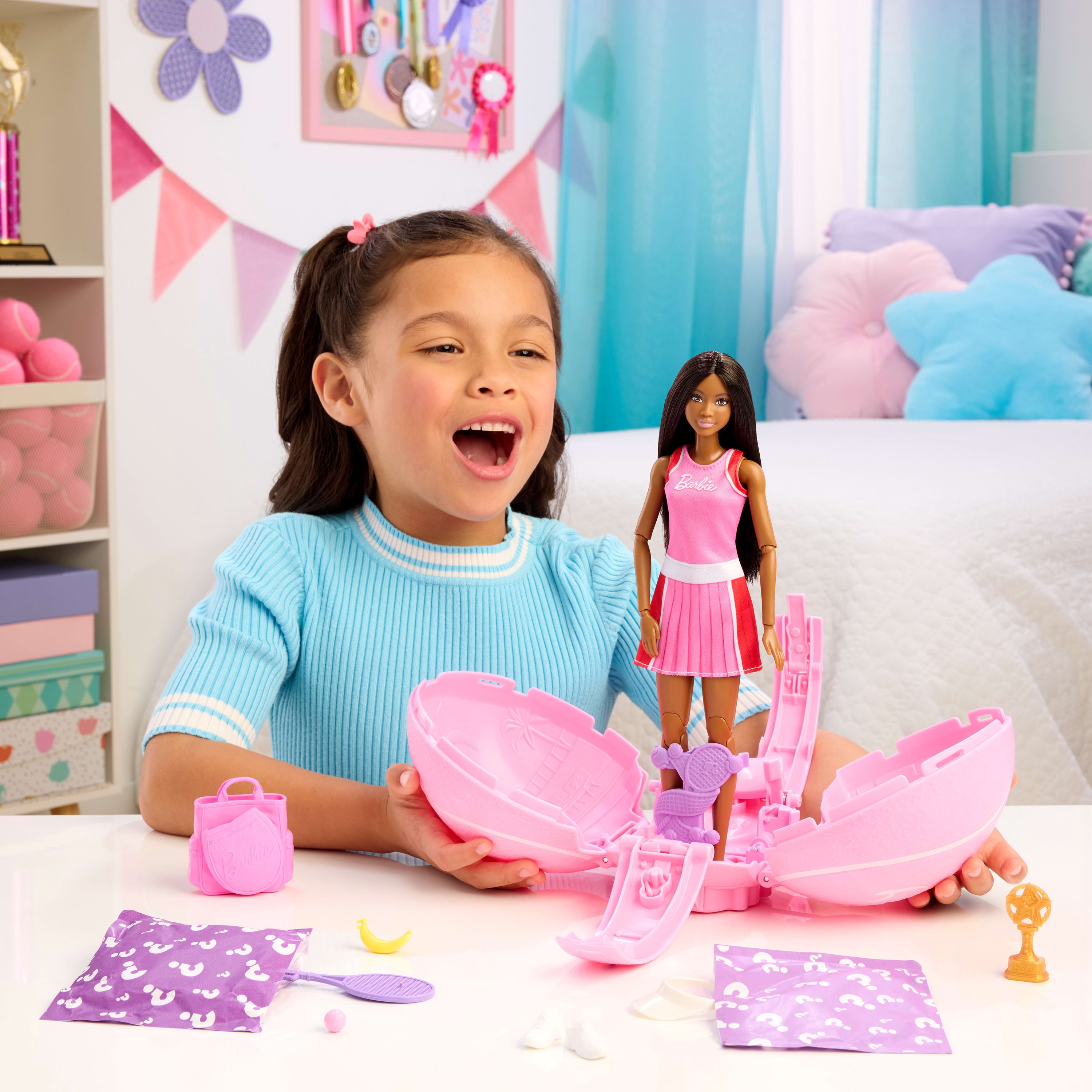 Barbie Team Barbie Roll and Reveal Tennis Player Doll and Accessories with Brunette Fashion Doll, 8 Surprises & Tennis Ball Encasement