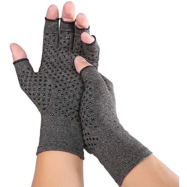 Arthritis Compression Gloves for Men and Women, designed for arthritis pain relief in hands, featuring a fingerless design for flexibility. The gloves are grey with a textured surface for added grip and targeted compression therapy to reduce stiffness, swelling, and joint inflammation. Suitable for conditions like rheumatoid arthritis, osteoarthritis, and carpal tunnel syndrome. Shown in a close-up view, highlighting the snug fit and breathable material.