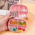 thumbnail image 1 of weibbin Pilulier Hebdomadaire - Étui à Médicaments Portable à 7 Compartiments, Rose, 1 of 7