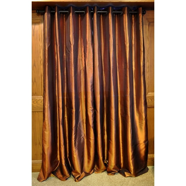 SUN TEXTILE GROMMET TAFFETA CURTAIN hanging front-facing on a black metal rod with grommets, made of textured light-filtering taffeta fabric with a shiny metallic copper brown finish, set in a wooden door frame over beige patterned carpet, ideal for window treatments and light filtering.