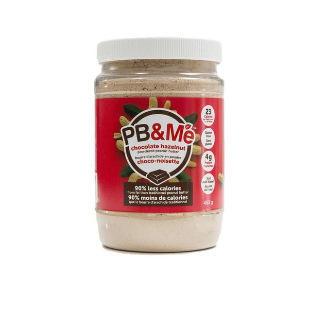 PB&Me Chocolate Hazelnut Powdered Peanut Butter in a 453 g jar. The jar features a red label with nutritional highlights, including 90% less calories than traditional peanut butter, 23 calories per serving, and 4 g of protein. Ideal for spreads, recipes, shakes, smoothies, or as a hazelnut spread.