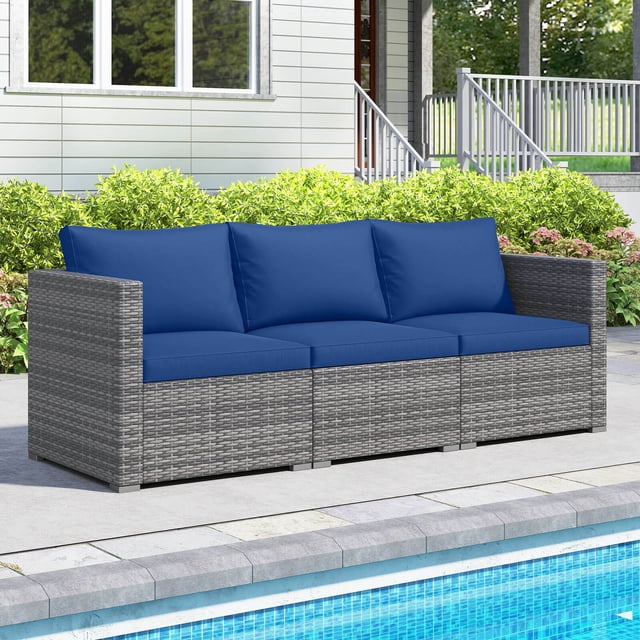 Costway 3PCS Patio Sectional Sofa Set, PE Rattan Modular Couch Furniture Set with Cushions Navy + Mix Gray A centered, front-facing view of a modular sectional outdoor conversation set: mix-gray hand-woven PE rattan frames with navy sponge-filled seat and back cushions with zipper covers, right-arm, left-arm and armless modules, wide armrests, metal frame and anti-slip foot pads, 15" seat height, shown on a patio; suitable as extra guest seating for backyard gatherings.