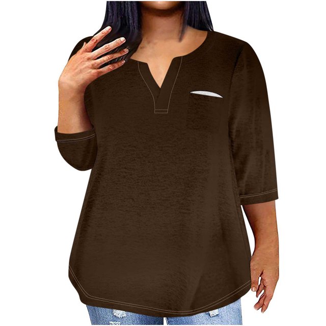 QIPOPIQ Plus-Size Tops for Women Summer V Neck T Shirts Color Block Raglan Tees Clearance in a solid brown color. The top features a V-neckline, three-quarter sleeves, and a small chest pocket. Made from lightweight, breathable fabric, it offers a loose, comfortable fit, ideal for casual occasions. Shown paired with distressed denim jeans.