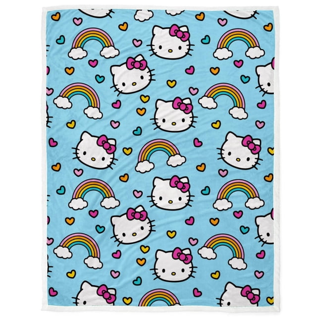Hello Kitty 'Rainbows and Hearts' Silk Touch Sherpa Throw Blanket in gift box, featuring a light blue throw with repeating white Hello Kitty faces with pink bows, colorful rainbows with clouds, and small hearts in pink, orange, and teal. Made of 100% polyester with a soft silk touch front and plush sherpa back, measuring 50 by 70 inches. Machine washable and suitable for adding warmth and style to bedding or living room decor.
