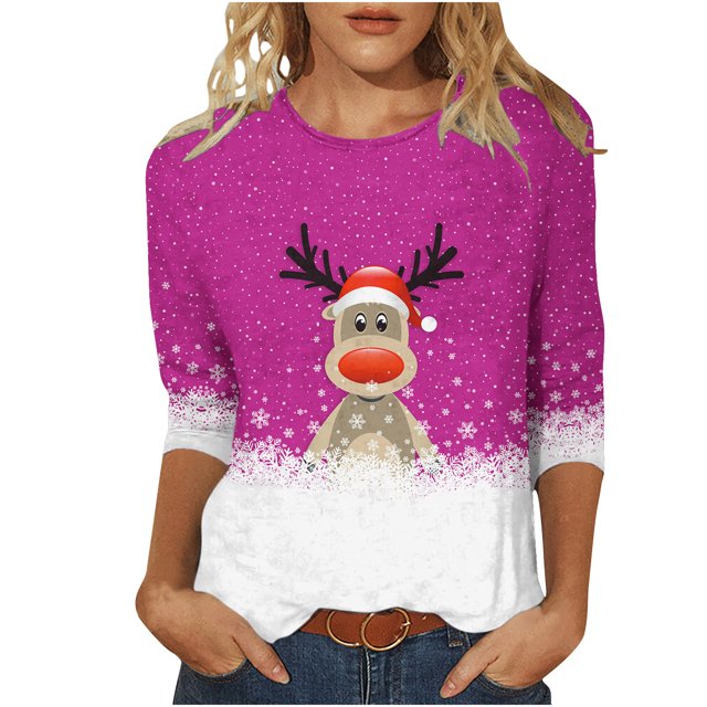 Women's Round Neck Three Quarter Sleeve Christmas Printed Top with a festive reindeer design wearing a Santa hat on a pink background. Snowflake patterns decorate the hem and sleeves. Made from lightweight polyester, this holiday top is ideal for casual wear, Christmas parties, and winter celebrations.