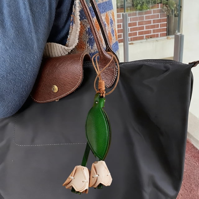 EGNMCR Advanced Sense Tanned Leather Cowhide Car Rearview Mirror Decoration Bag Pendant Keychain Decoration Artificial leather keychain