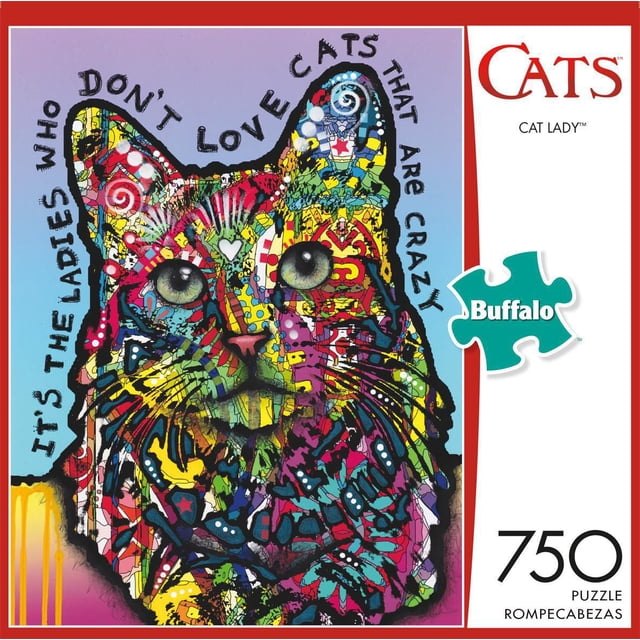 Buffalo Games - Cats - Cat Lady - 750 Piece Jigsaw Puzzle featuring a vibrant multicolour abstract cat face with green eyes and intricate patterns in red, yellow, blue, and purple. The puzzle box displays the phrase 'It's the ladies who don't love cats that are crazy' around the cat's head. Includes 750 pieces and a full-colour bonus poster for assembly reference.