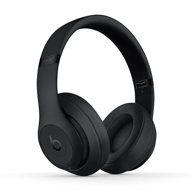 Beats Studio3 Wireless Over Ear Headphones in matte black with padded over-ear cushions and adjustable headband, shown in a 3/4 profile. Features active noise cancelling, Apple W1 chip for Class 1 Bluetooth connectivity, and up to 22 hours battery life, ideal for immersive wireless listening and extended comfort.