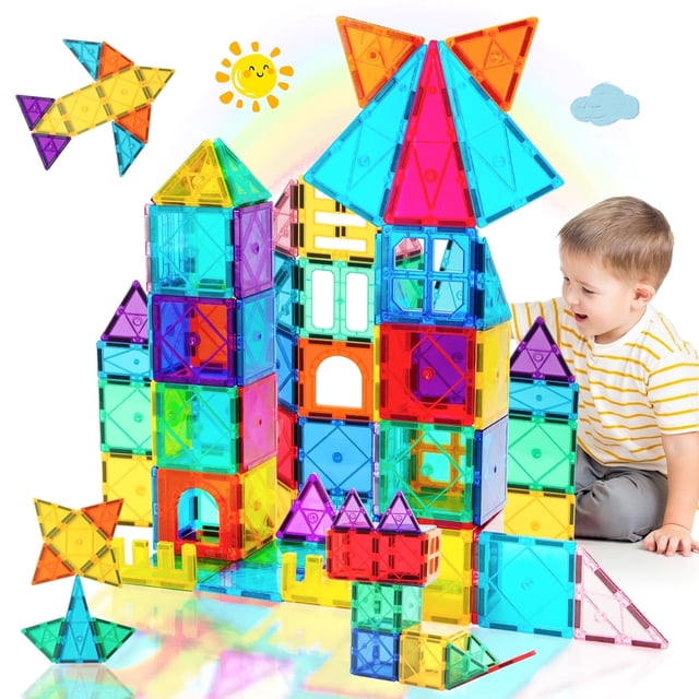 GRM Magnetic Tiles, 41 Pieces, 3D Magnetic Building Blocks for Kids, an educational toy designed for STEM learning. The vibrant tiles in blue, red, yellow, and green are assembled into a castle-like structure with triangular and square shapes, alongside smaller creations like a star and rocket. A child is seated nearby, engaging with the toy. Ideal for promoting creativity, logical thinking, and motor skills in children aged 3 and up.