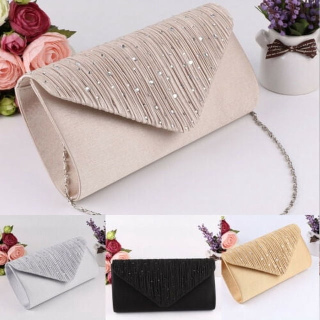 Women Evening Wedding Party Prom Bridal Clutch Purse Handbag made of high-quality satin with a fully lined interior. Features a textured flap adorned with diamante embellishments and includes a detachable chain for shoulder or handheld use. Available in silver, black, gold, and apricot colors. Approximate dimensions: 11cm height, 22.5cm width, and 7cm depth. Suitable for weddings, parties, or formal events.