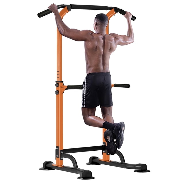 SogesPower Adjustable 82.7"H Pull up Bar Power Tower Multifunctional Fitness Station for Home. A durable orange and black metal frame with adjustable height from 65" to 82.7". Designed for strength training, it features non-slip grips, sweat-absorbent handles, and a splayed anti-eversion base for stability. Supports up to 330lbs and accommodates pull-ups, dips, push-ups, and knee raises. Ideal for home, office, or gym use.