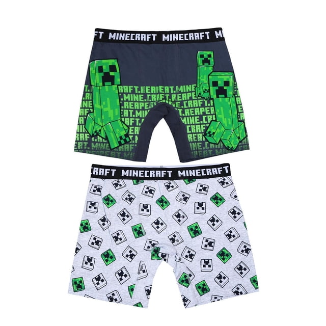 MINECRAFT - Knit Underwear 2 Pack - Adults - Men featuring two boxer briefs; one dark grey with large green Creeper pixel characters and repeated 'MINECRAFT REAPER' text, the other light grey with an all-over pattern of green and black Creeper faces, both with black elastic waistbands branded 'MINECRAFT', offering stretch and support for gaming or casual wear.