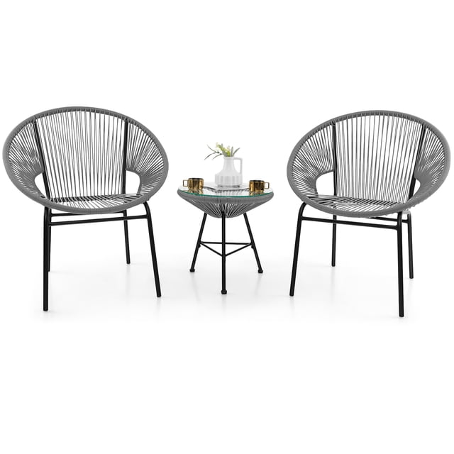 Gymax 3 Pieces Acapulco Chair Set Wicker Conversation Bistro Set with Tempered Glass Table. Features two grey PE rattan chairs with ergonomic backrests and sturdy metal frames, and a round tempered glass side table. Lightweight and ideal for small outdoor spaces like patios, porches, gardens, or compact balconies.