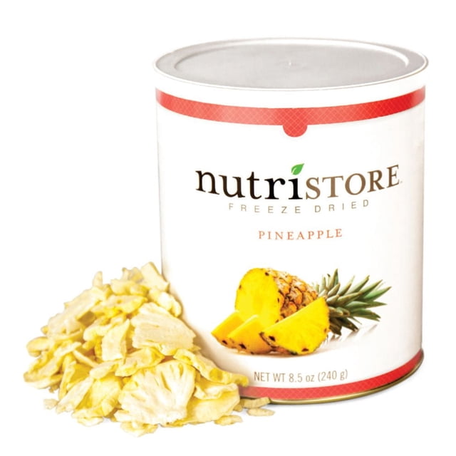 Freeze Dried Pineapple – Nutristore #10 Can displaying a white cylindrical container with red accents and an image of fresh pineapple slices, alongside a pile of pale yellow freeze-dried pineapple pieces, weighing 8.5 oz (240 g), suitable for long-term food storage and easy reconstitution.
