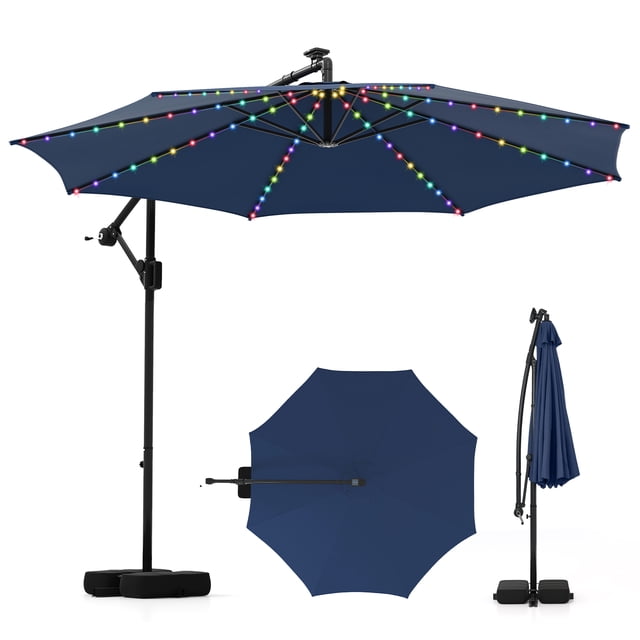 Costway 10 FT Solar Offset Hanging Umbrella with 96 Solar Multi-colored Flowing LED Lights in navy. Features a double-tier polyester canopy with 96 LED lights distributed across 8 ribs, offering 9 lighting modes powered by a solar panel. Includes a cross base with 2 sandbags for stability, supporting up to 155 lbs. The umbrella provides 360° rotation and infinite tilt for customizable shade. Ideal for outdoor spaces like patios, backyards, and poolside areas.