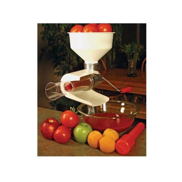 Victorio Kitchen Products VKP250 Food Strainer and Sauce Maker displayed on a countertop during use. This multicolour kitchen gadget features a BPA-free plastic hopper, stainless steel screen, and an improved handle for effortless cranking. Tomatoes are loaded into the hopper, with strained sauce collected in a glass bowl below. Fresh fruits, such as apples and peaches, are arranged nearby. The clamp-on base securely mounts to countertops, making it ideal for food preparation tasks like sauce making and straining.