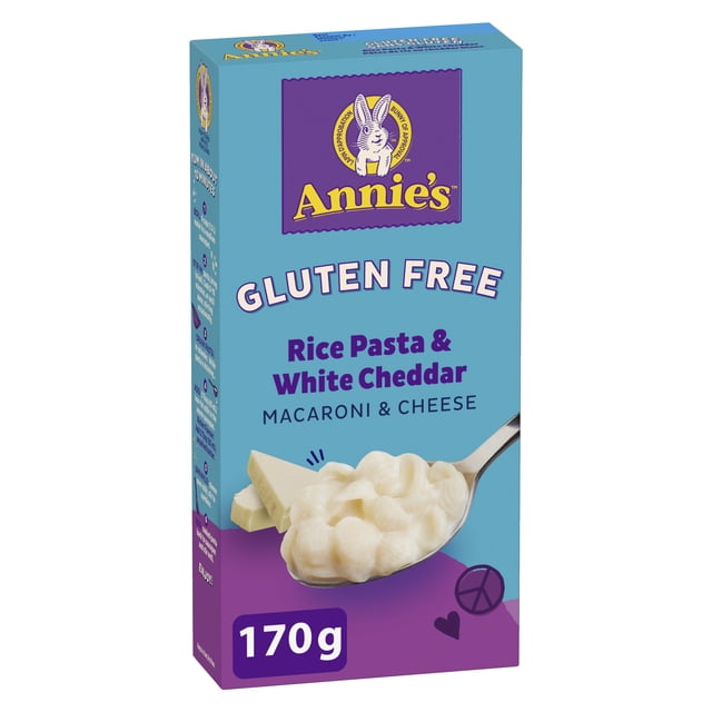 Annie's™ Gluten Free Rice Pasta & White Cheddar Macaroni & Cheese box with blue and purple packaging, featuring the Annie's bunny logo, a spoonful of creamy white cheddar macaroni, and 170g weight, ideal as a gluten-free instant meal or pasta side dish.